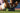 Person using a K-Shape foam roller on grass