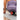 Person uses a massage roller on their thigh while sitting on a yoga mat in a fitness setting.