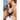 A woman practices yoga outdoors with a massage ball on her shoulder.